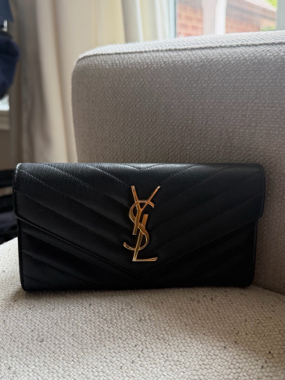 Saint Laurent CASSANDRE MATELASSÉ LARGE FLAP WALLET IN GRAIN DE POUDRE LEATHER